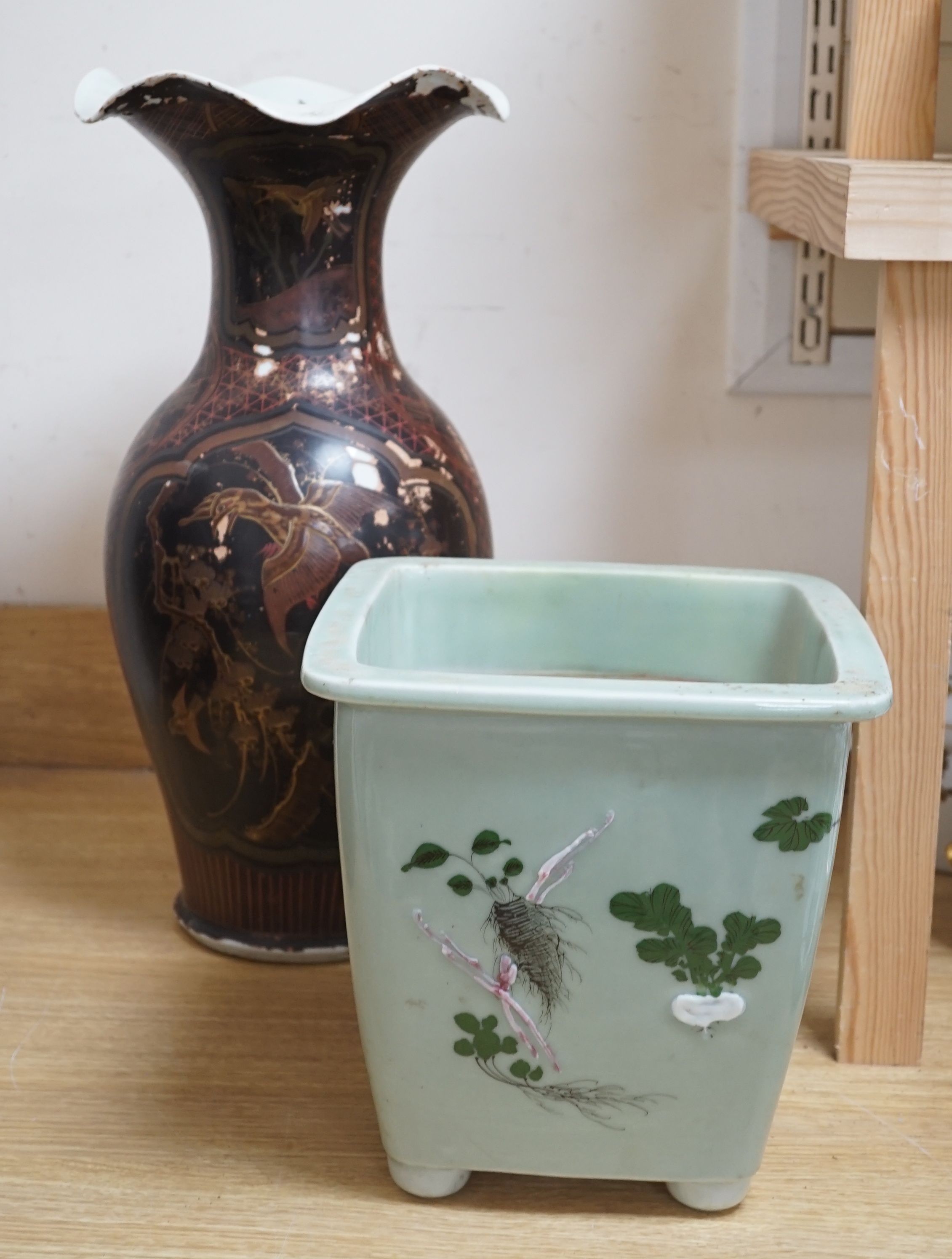 A large Japanese lacquered porcelain vase and a Japanese celadon ground jardiniere-vase 50 cms high.